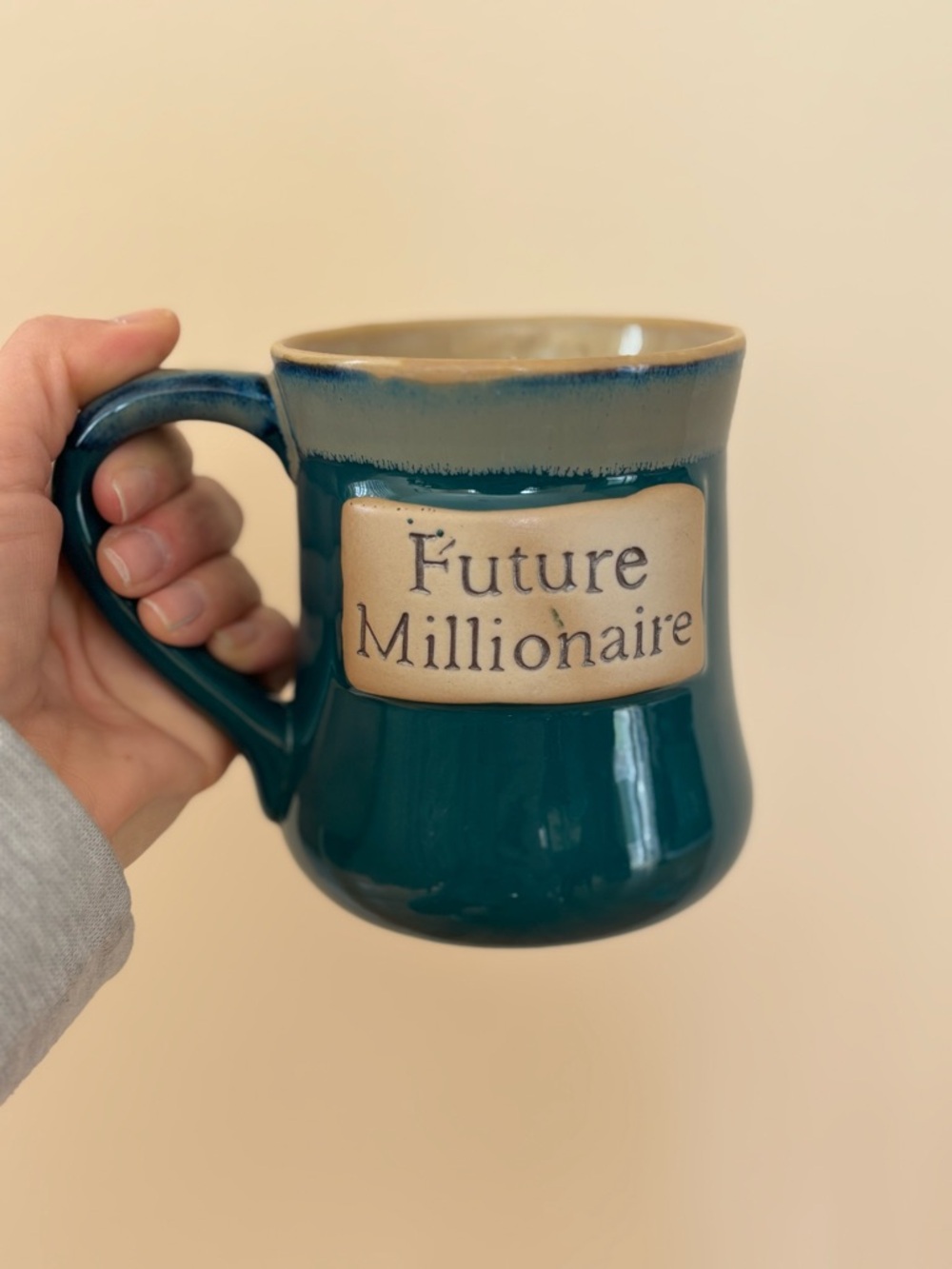 Tumbleweed Pottery Mug “Future Millionaire” in Teal & Tan